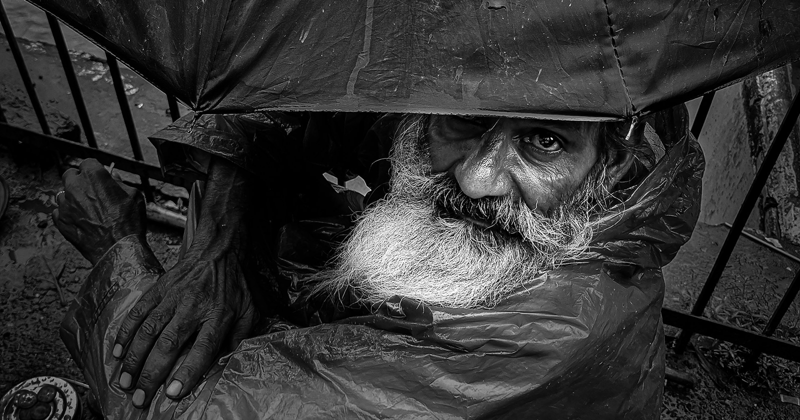Homeless man in the rain