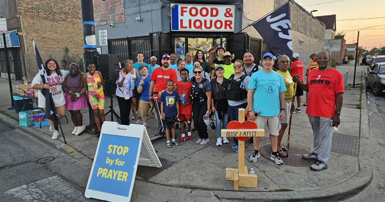 A team from Peace Campaign gathers at one of their weekly events. Colton Vincent, pictured in the far back center, is in a dark green shirt. Marc Henkel, in the front, second from the right, is wearing the light blue T-shirt.