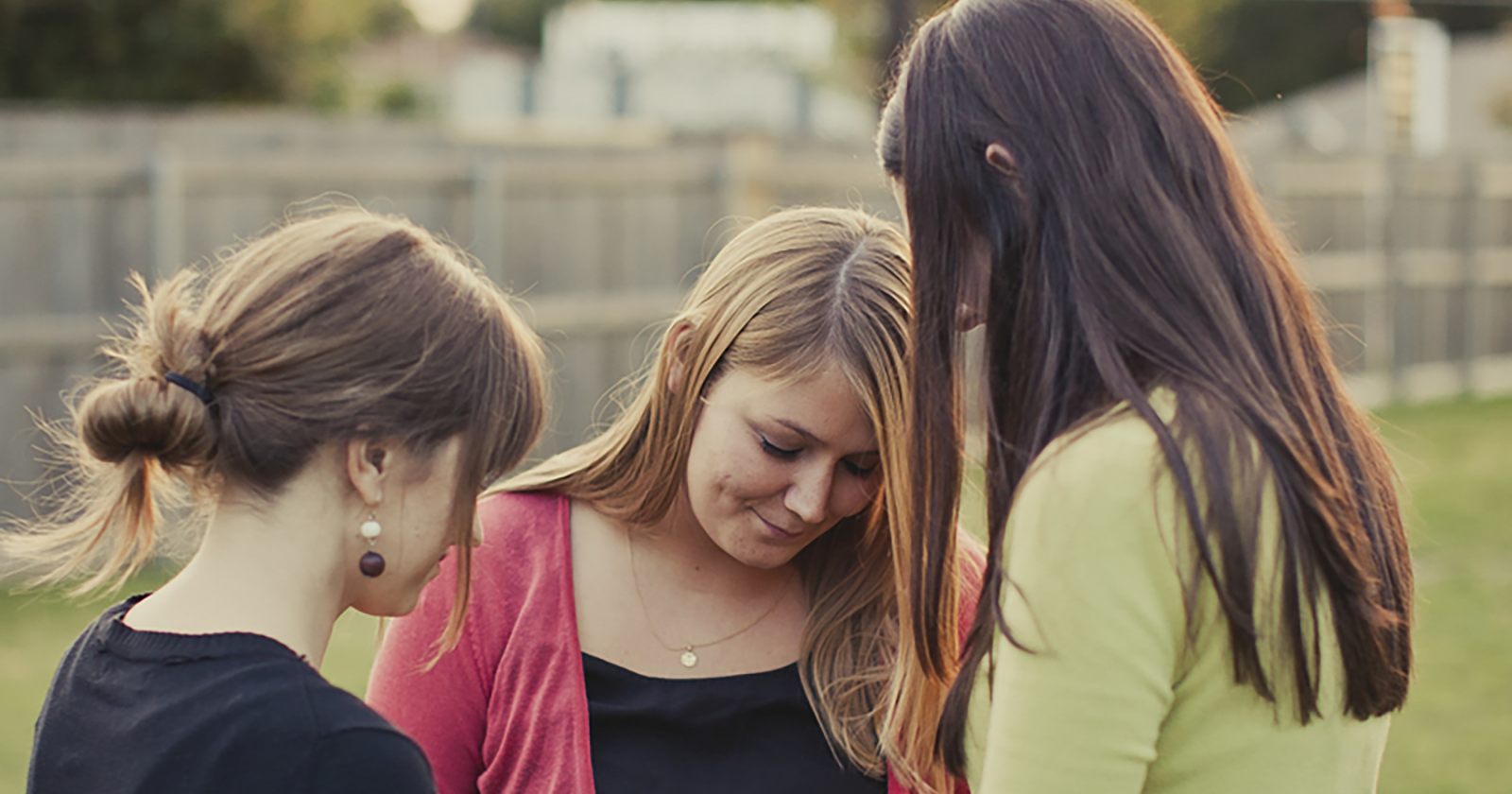 Three women praying